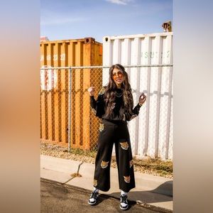 Dressed in LaLa tiger sweater playsuit